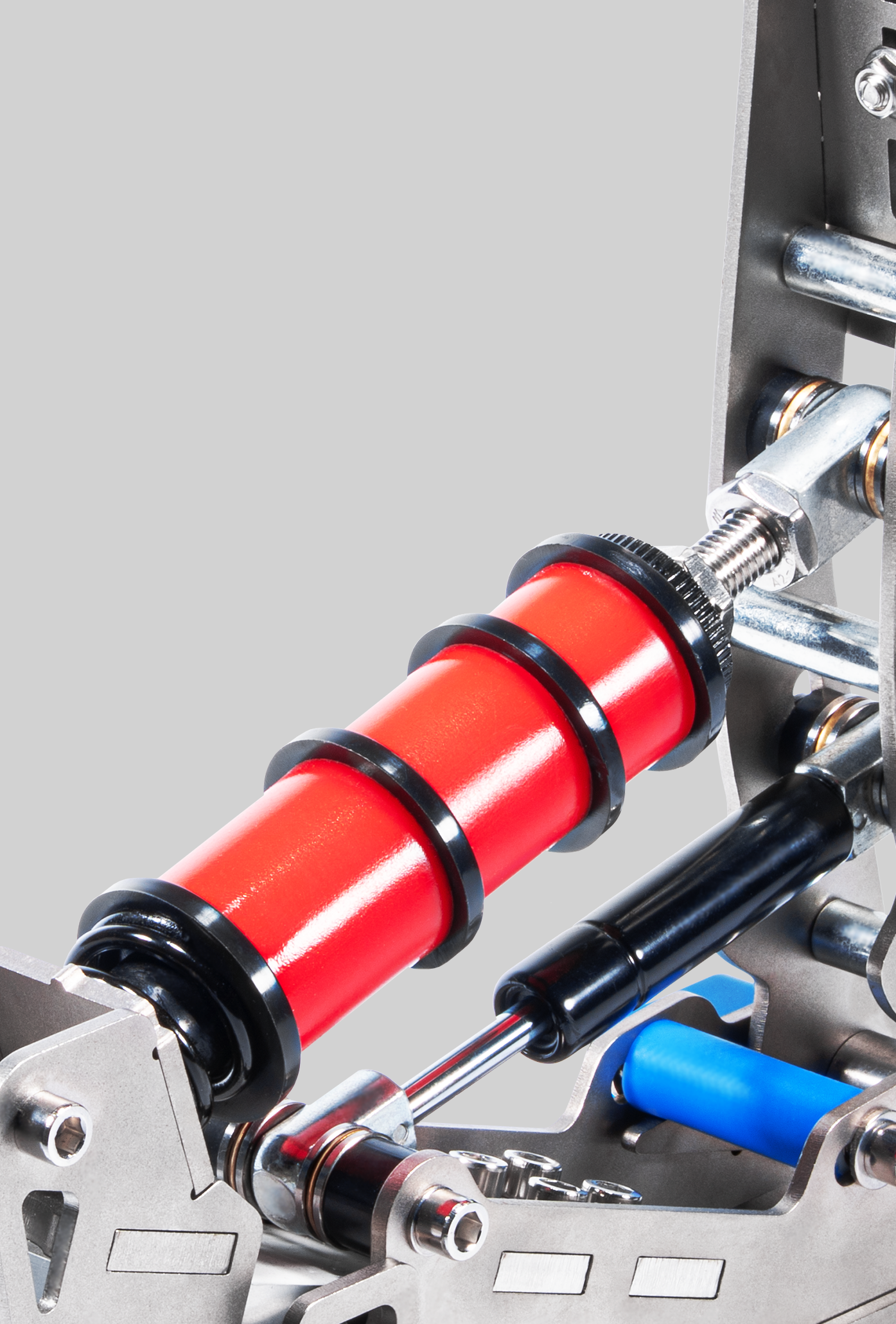 Plus X V2 dual-stage braking — rubber damper and coil spring